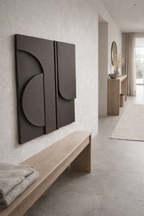 wabi sabi textured plaster wall art above sofa in neutral interior