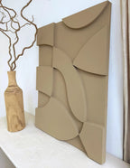 neutral textured plaster wall art