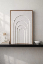 japandi textured plaster wall art above sofa in neutral interior