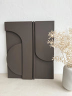 minimalist plaster wall sculpture