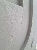 sculptural handmade 3d plaster wall hanging for living room above sofa