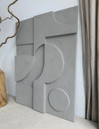 organic textured plaster wall art for japandi living room interior